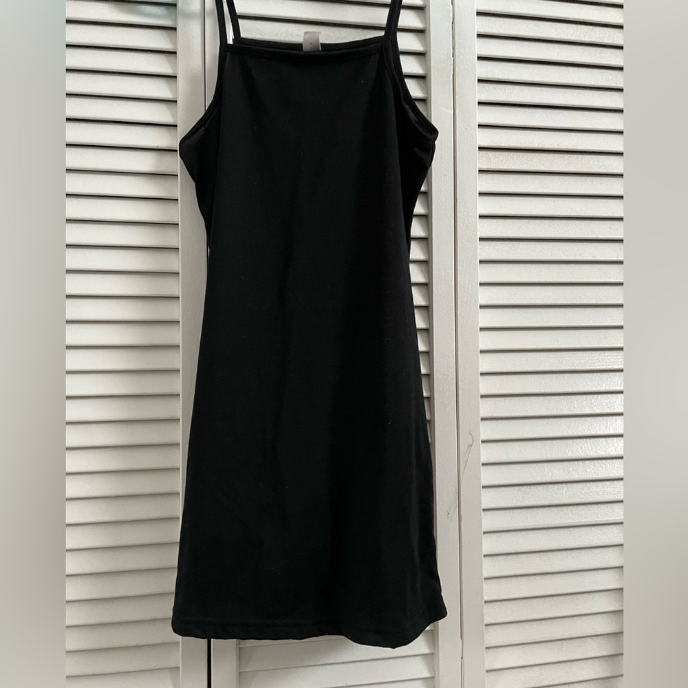 Black dress is a size 16 in good condition.